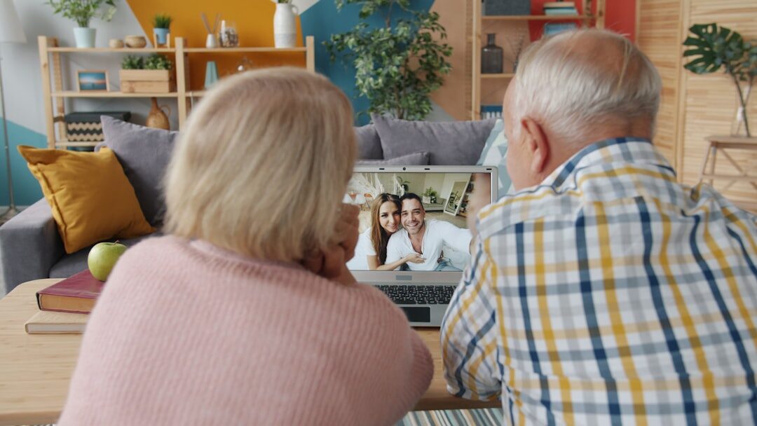 senior couple talking to social worker
