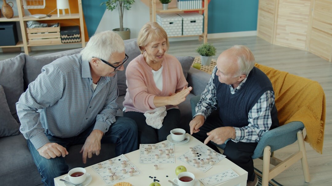 senior couple talking to social worker